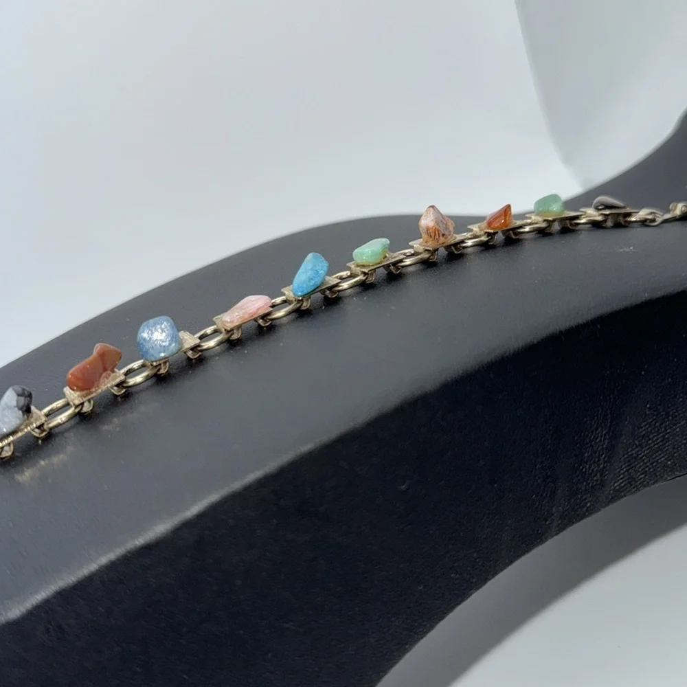 Vintage Gold tone link charm bracelet with various colored “stones” boho hippie